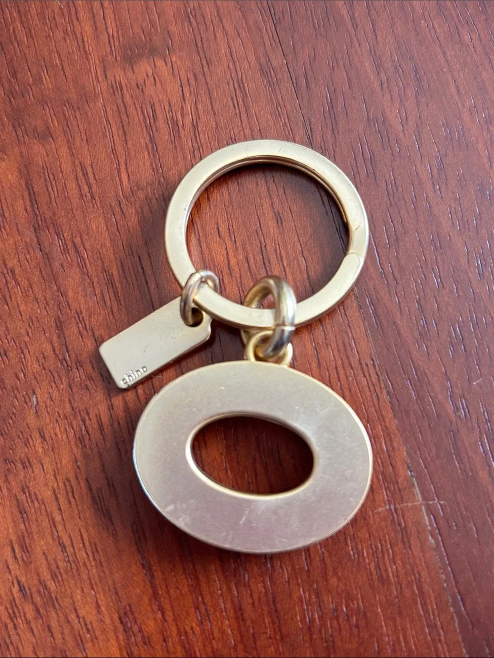 Coach Gold-Tone Keyring with Pink Crystal Oval Charm